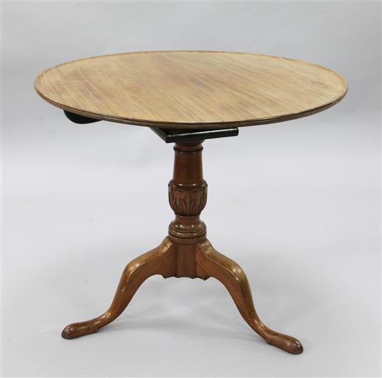 A George III mahogany tripod table W. 2ft 9in. H. 2ft 5in.